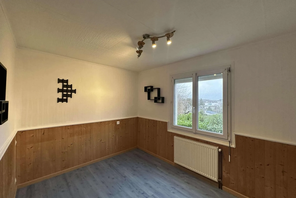 Maison à Baud avec 4 chambres, terrasse EST et sous-sol complet 