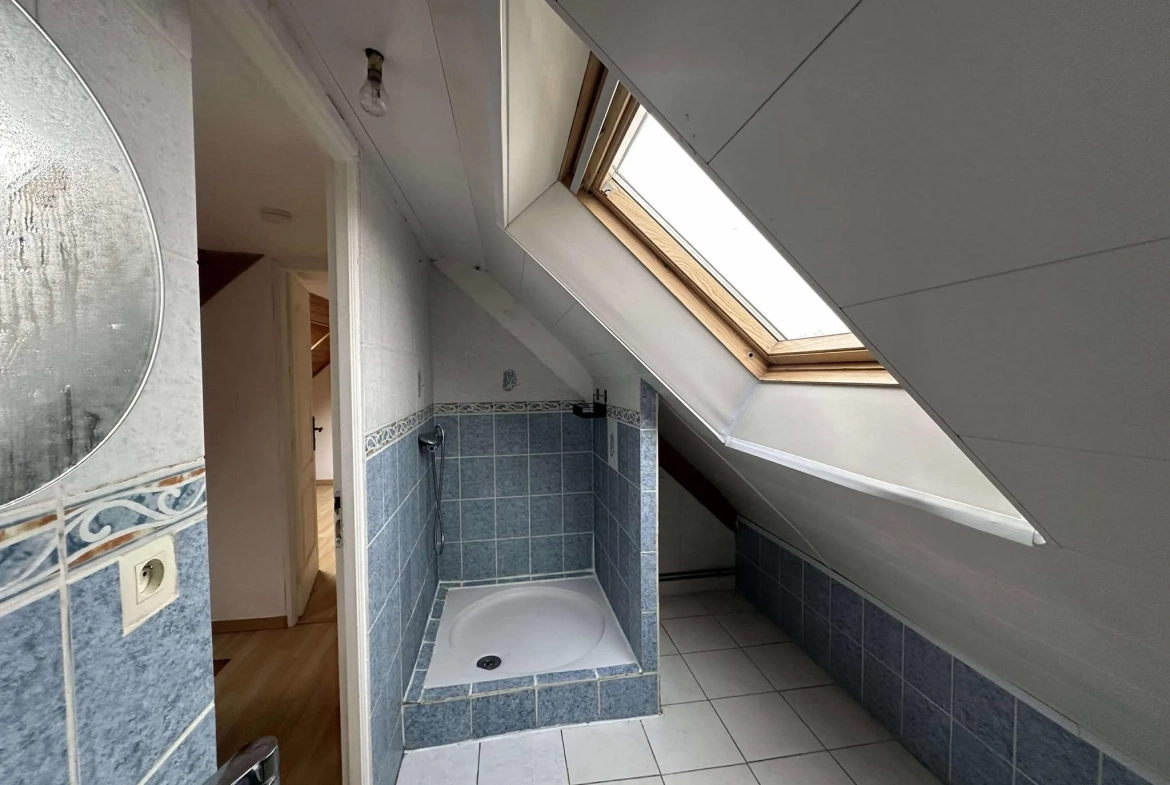 Maison à Baud avec 4 chambres, terrasse EST et sous-sol complet 