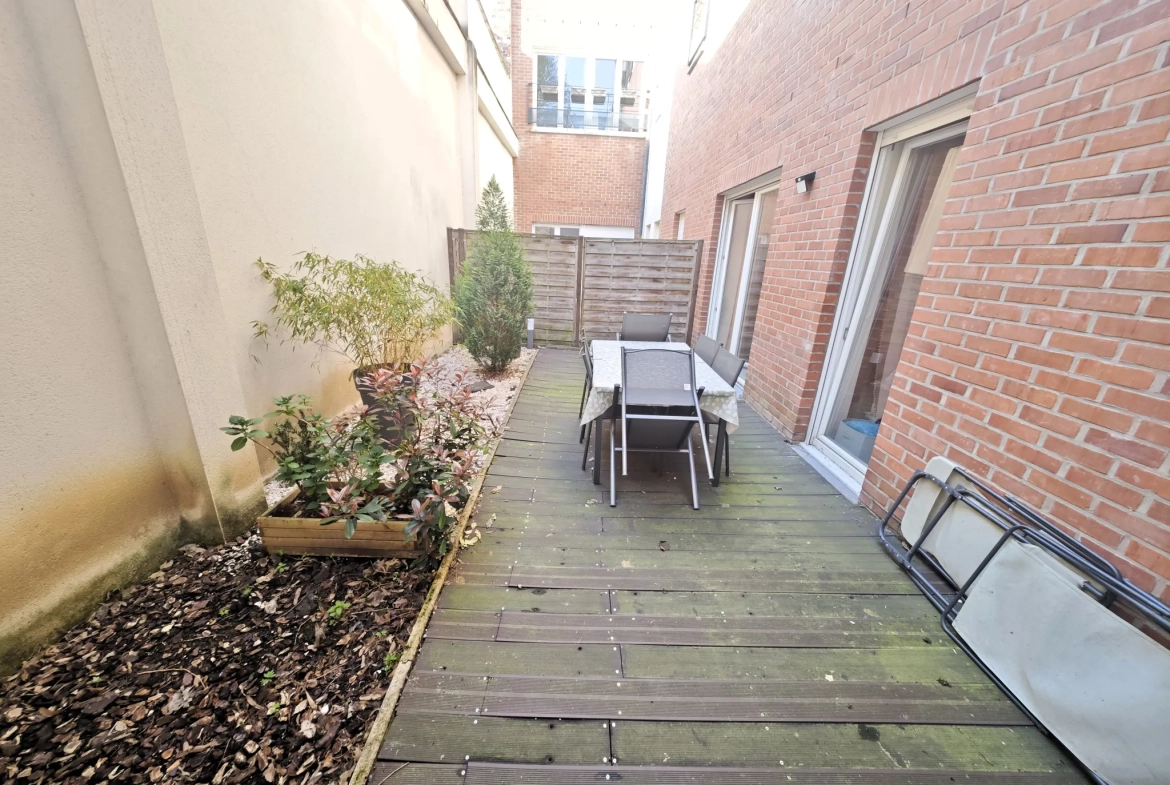 Appartement T2 avec terrasse, parking et emplacement central à Tourcoing 