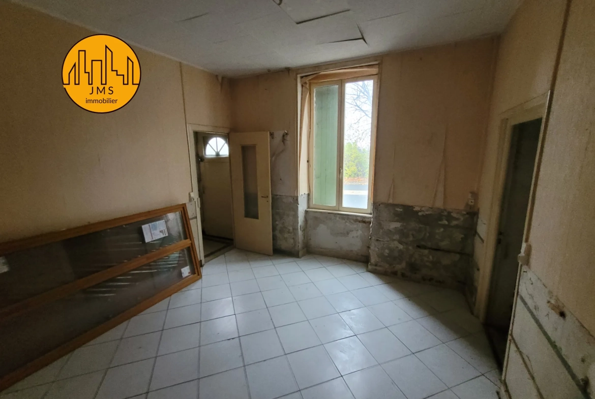 Maison à rénover avec garages et jardin à Montmaurault - Opportunité à saisir 