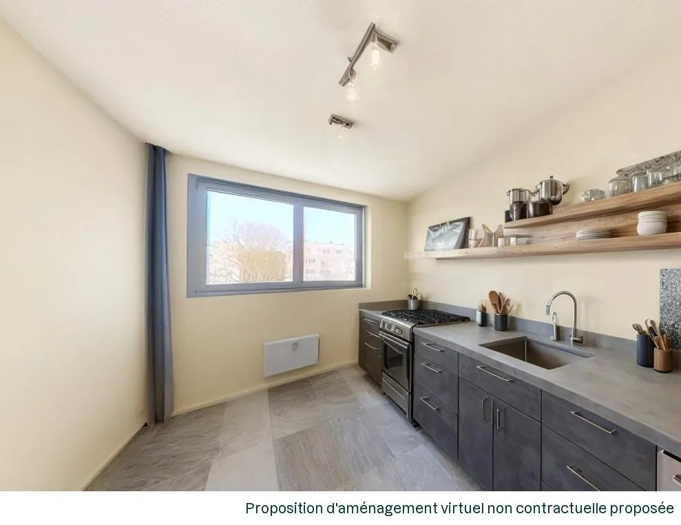 Appartement T3 à Caen de 82m² avec parking, cave et travaux à prévoir 