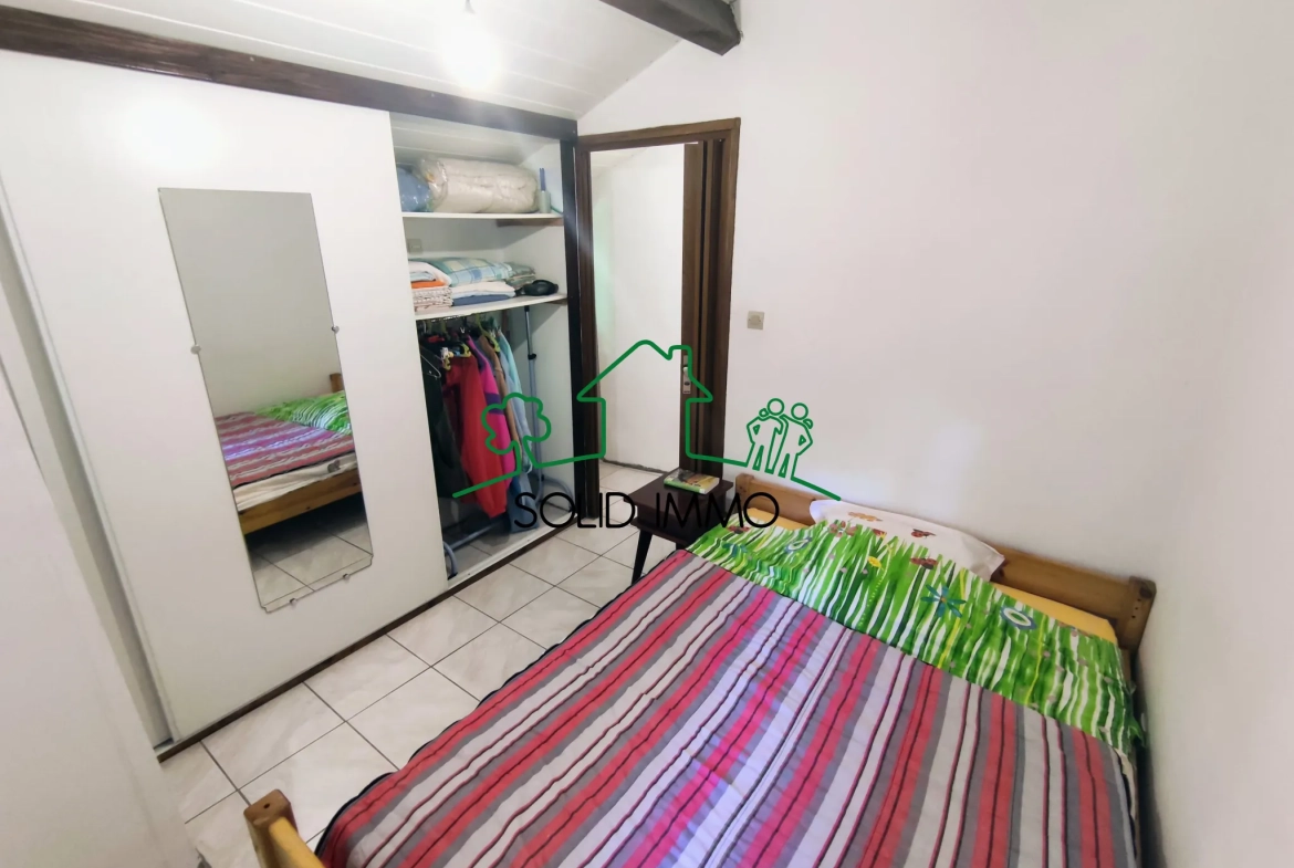 Maison de 50 m² avec terrain arboré à Joannas, idéal nature 
