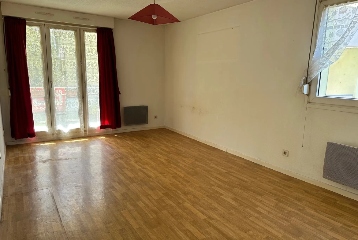 Appartement 2 pièces à vendre à Strasbourg Neuhof avec balcon, cave et parking 