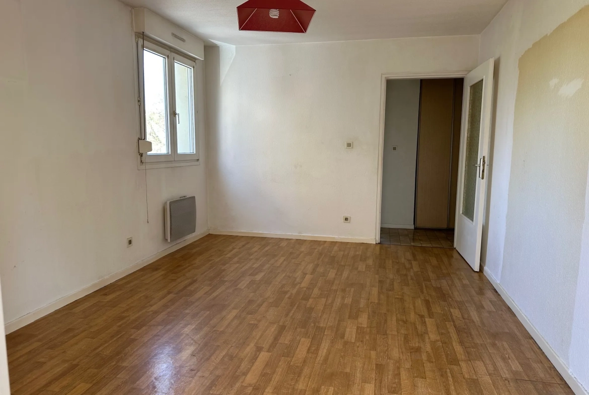 Appartement 2 pièces à vendre à Strasbourg Neuhof avec balcon, cave et parking 