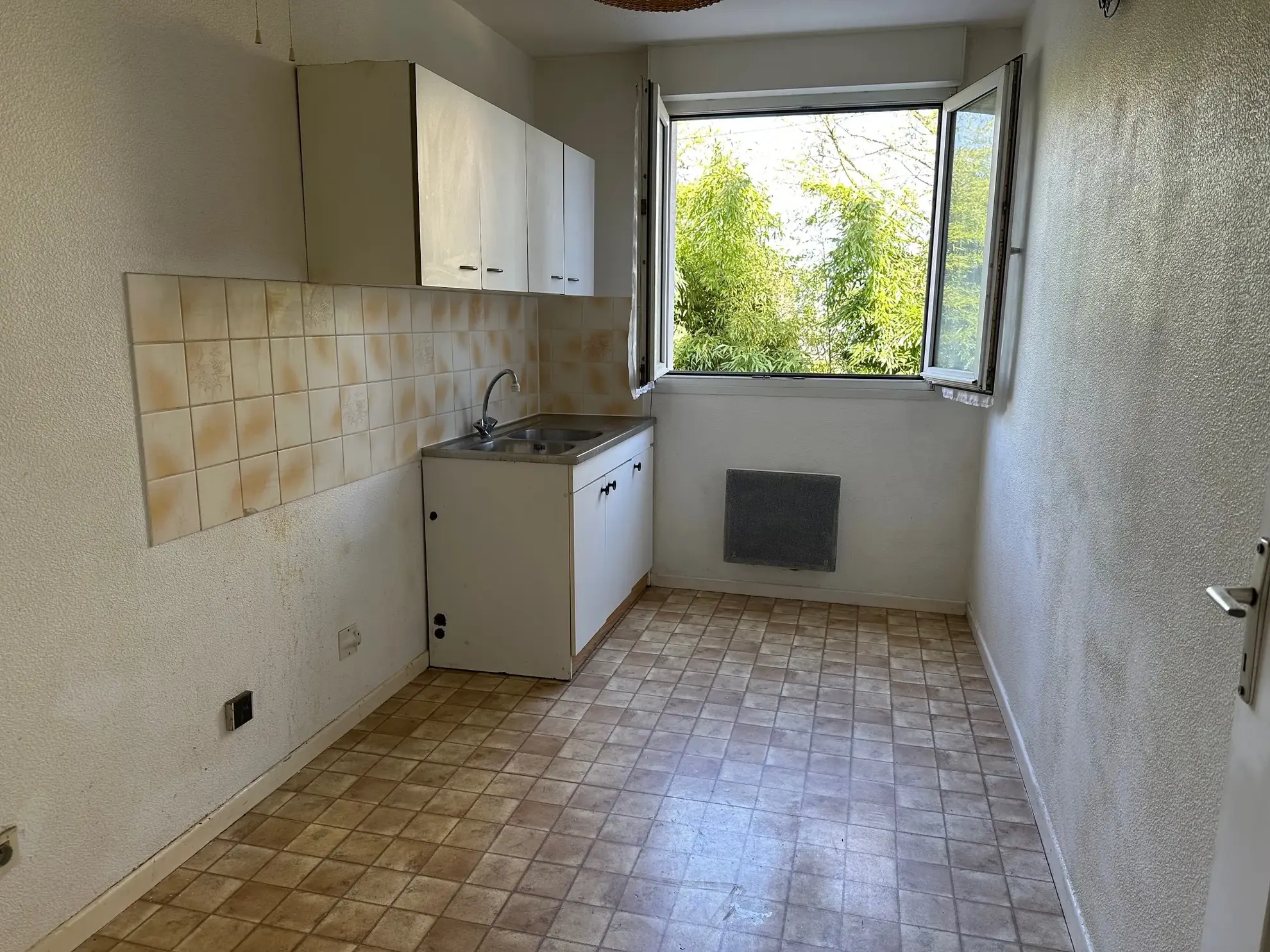 Appartement 2 pièces à vendre à Strasbourg Neuhof avec balcon, cave et parking 
