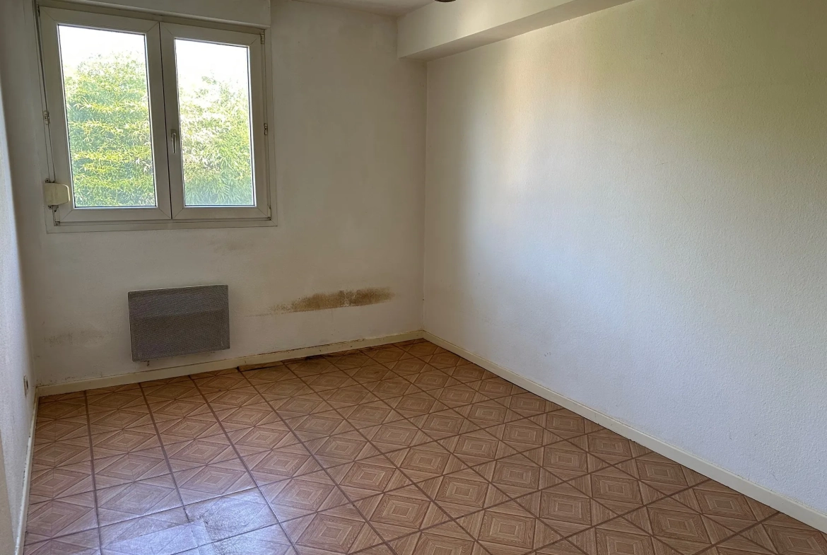 Appartement 2 pièces à vendre à Strasbourg Neuhof avec balcon, cave et parking 