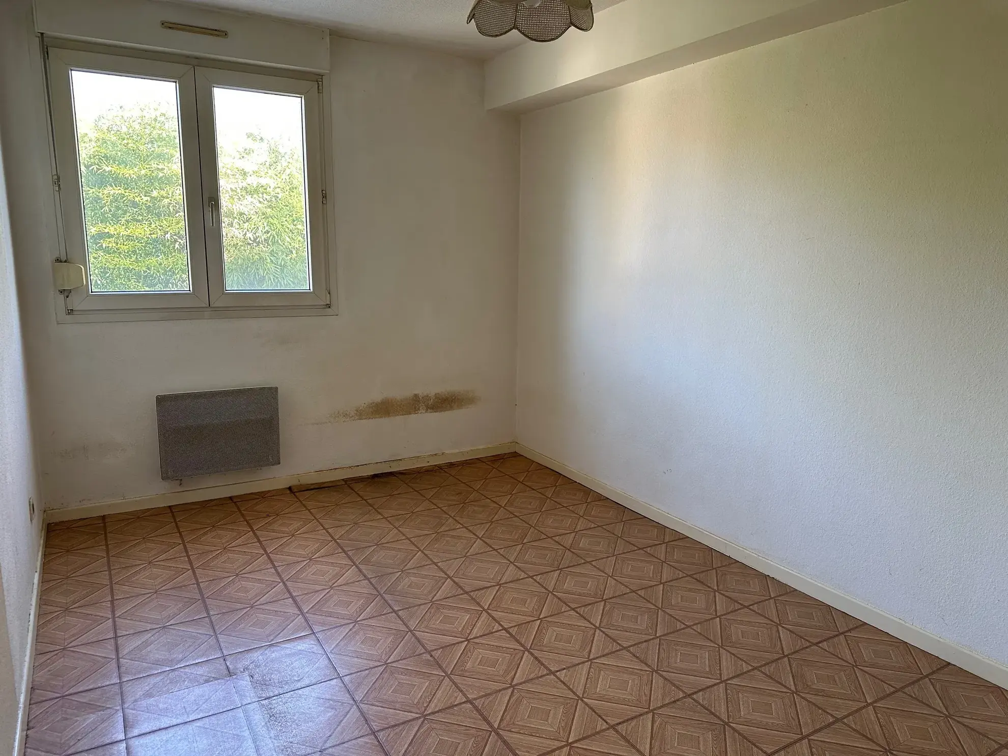 Appartement 2 pièces à vendre à Strasbourg Neuhof avec balcon, cave et parking 