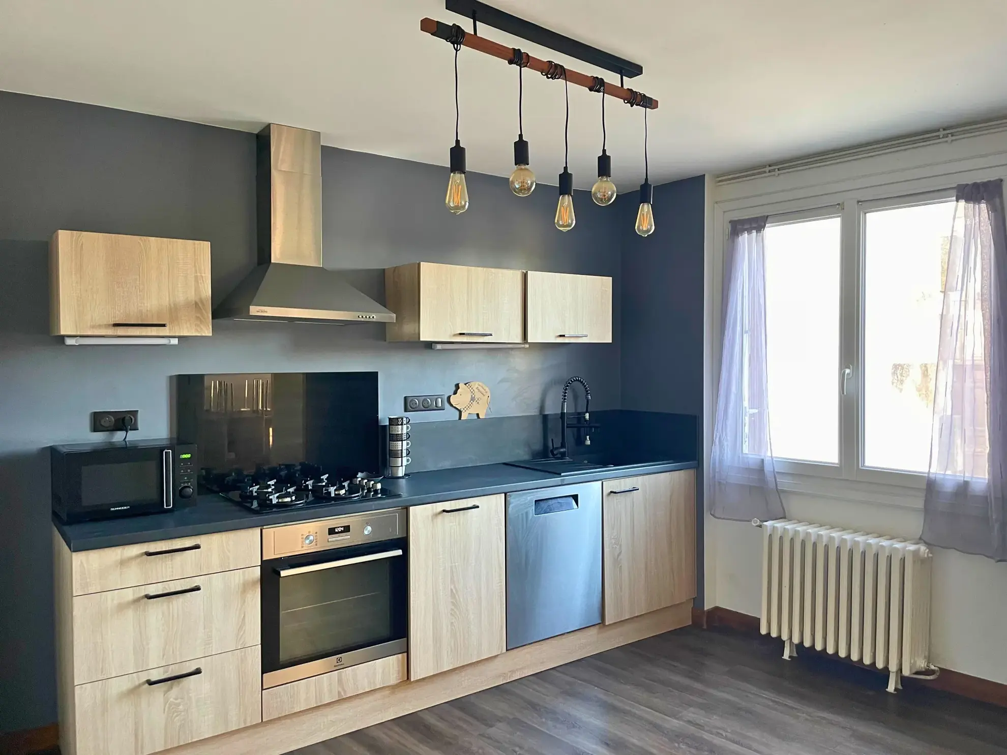 Maison rénovée à Cognac avec cour, garage et orientation sud 