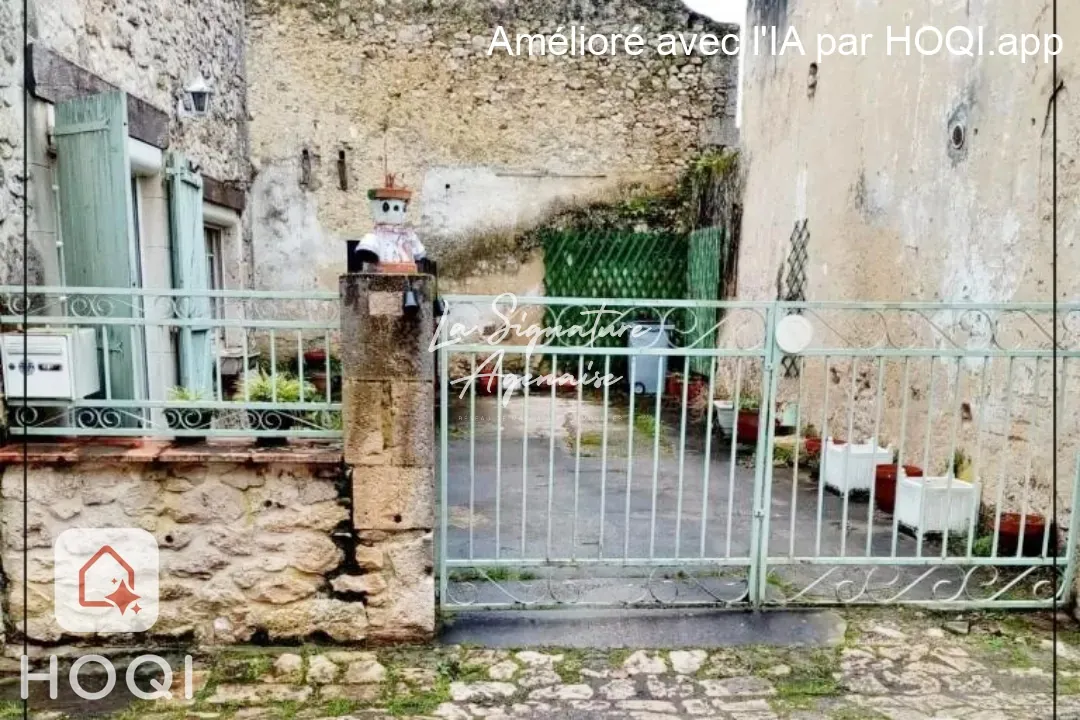 Maison en pierre de 113 m² avec cour intérieure et jardin à Vianne 
