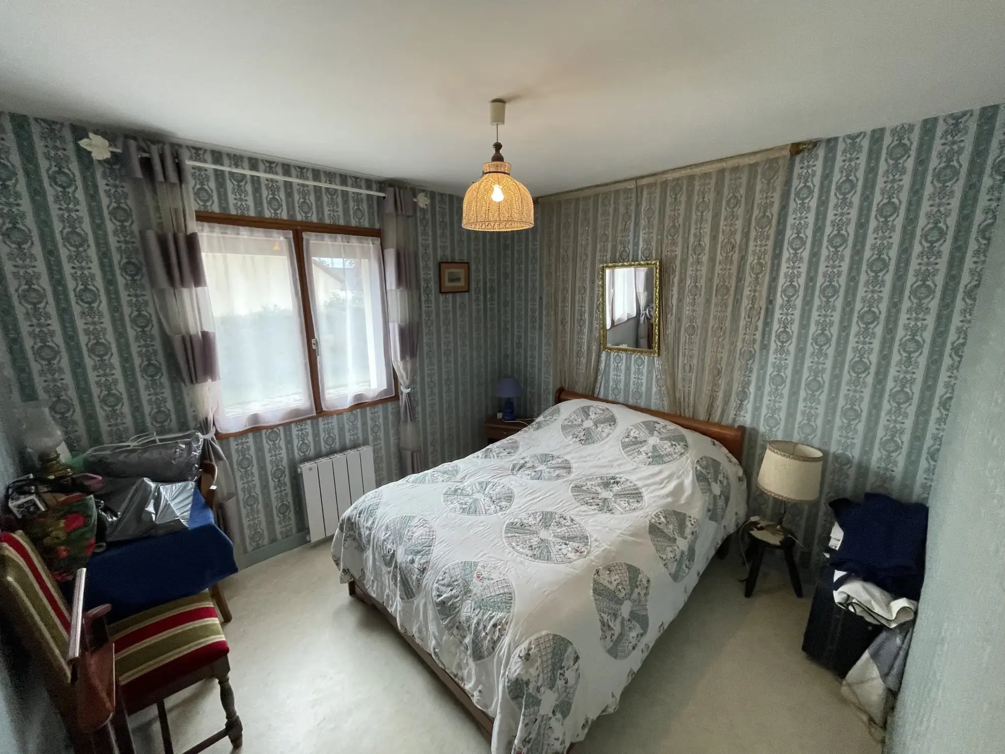 Maison de plain-pied à Luche Pringe de 112 m² avec garage et dépendances 
