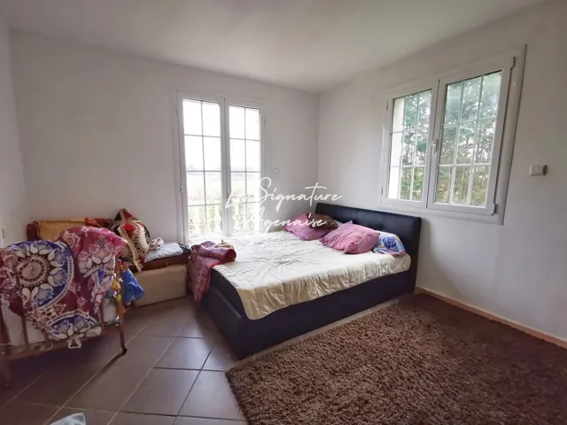 Spacieuse Maison de 8 Pièces et 235 m² à Feugarolles, Calme et Espaces Verts 