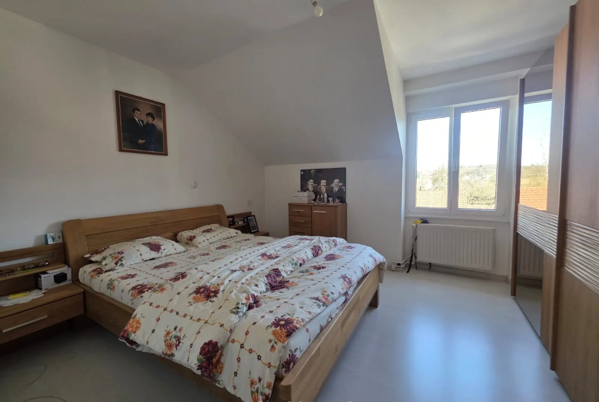 Maison mitoyenne à Hirsingue de 61 m2 avec jardin et garage 