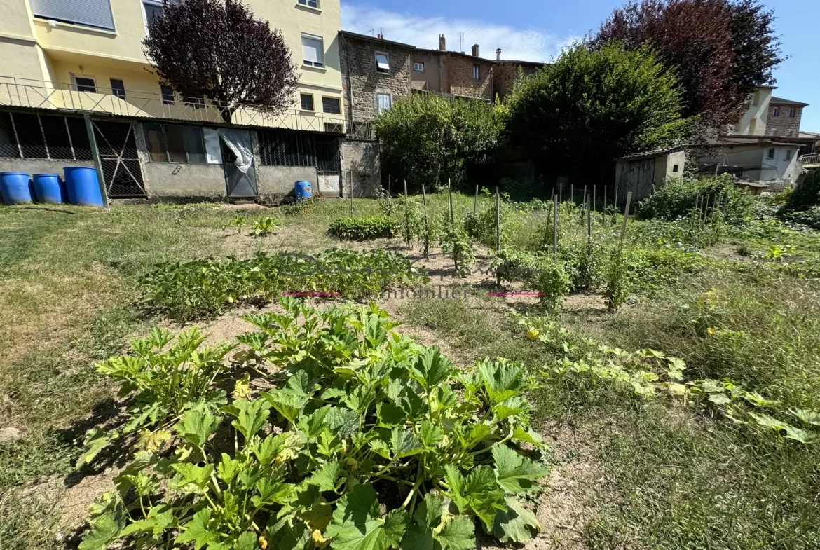 Appartement T2 bis avec cave et terrain à Amplepuis, village du 42 