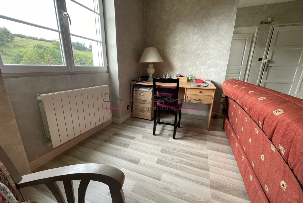 Appartement T2 bis avec cave et terrain à Amplepuis, village du 42 