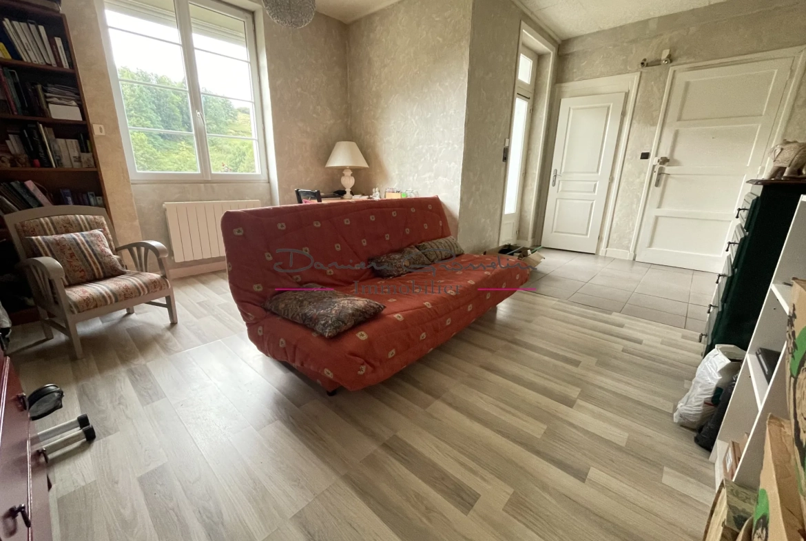 Appartement T2 bis avec cave et terrain à Amplepuis, village du 42 