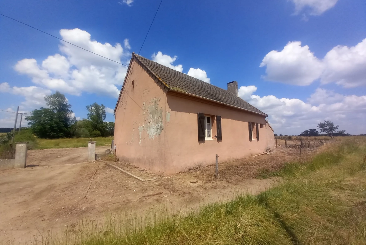 Charmante maison de plain-pied à Montambert avec terrain et dépendances 