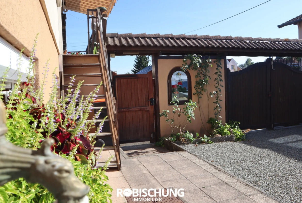 Maison à Dannemarie avec grand potentiel, jardin et dépendances 