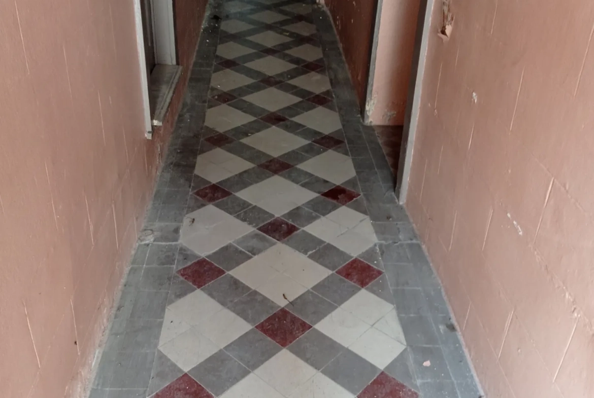 Maison à rénover de 200 m² au cœur de Vittel, potentiel d'investissement 