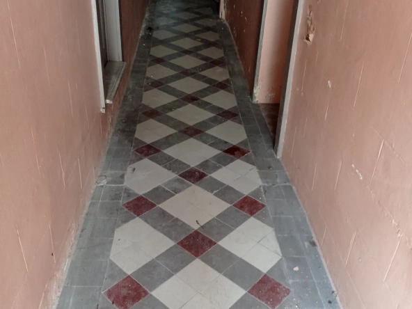 Maison à rénover de 200 m² au cœur de Vittel, potentiel d'investissement