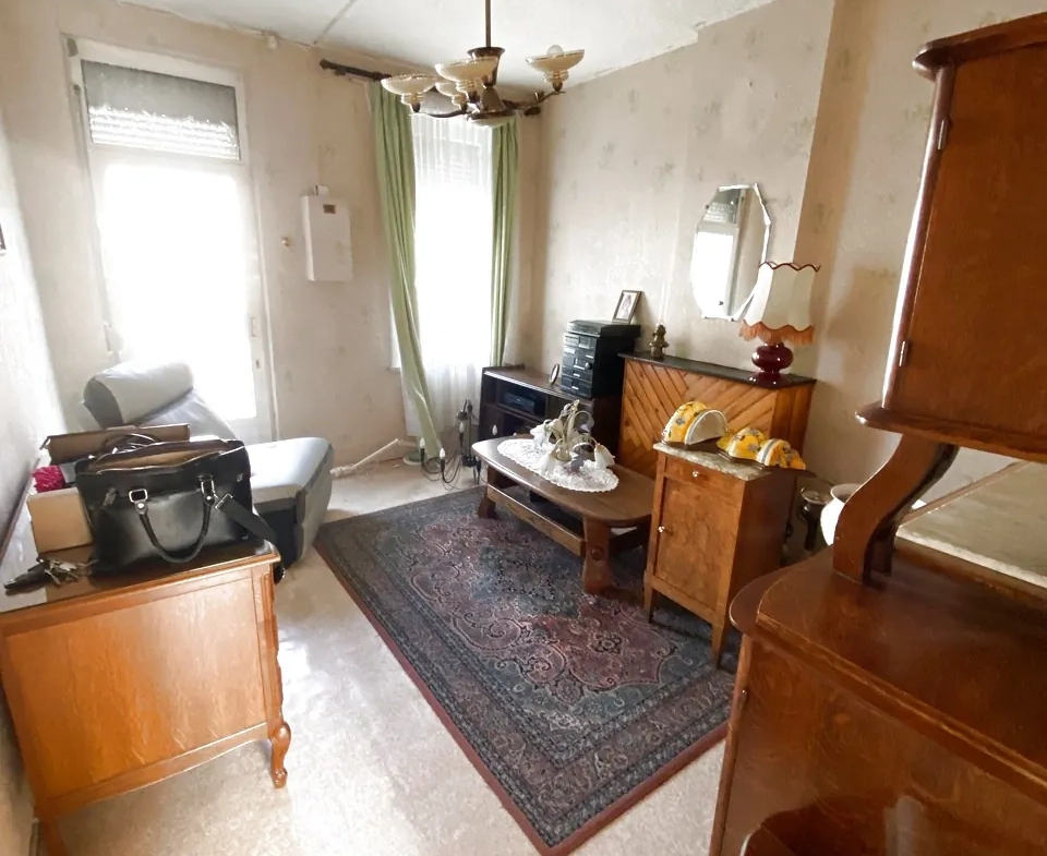 Maison en briques à Jeumont avec jardin et potentiel de rénovation 