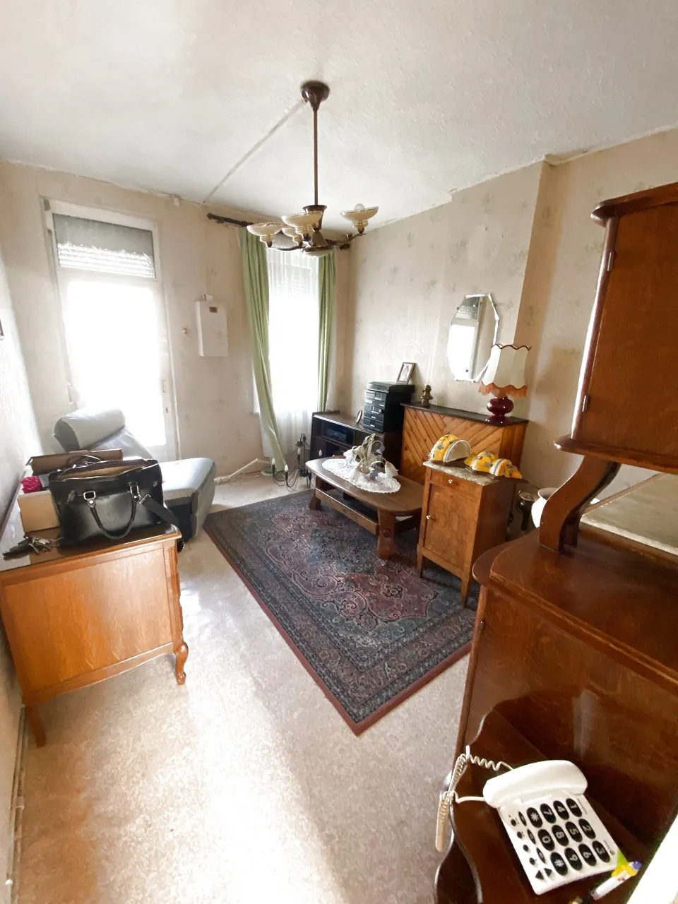 Maison en briques à Jeumont avec jardin et potentiel de rénovation 