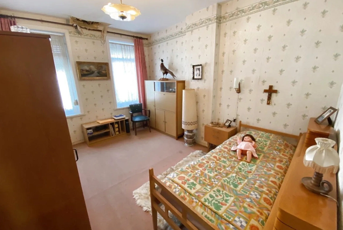Maison en briques à Jeumont avec jardin et potentiel de rénovation 