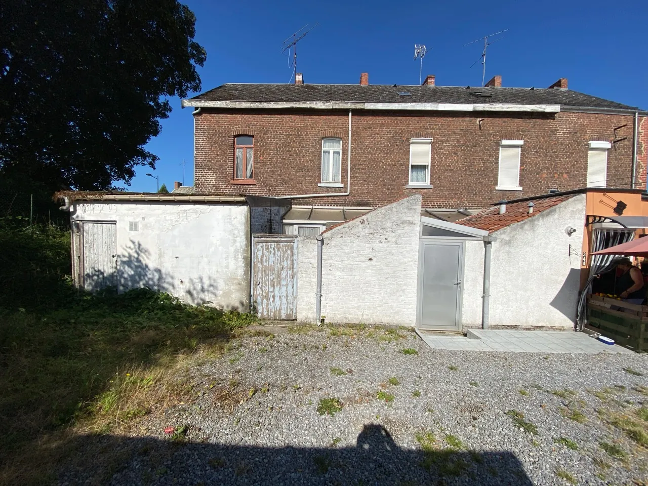 Maison en briques à Jeumont avec jardin et potentiel de rénovation 