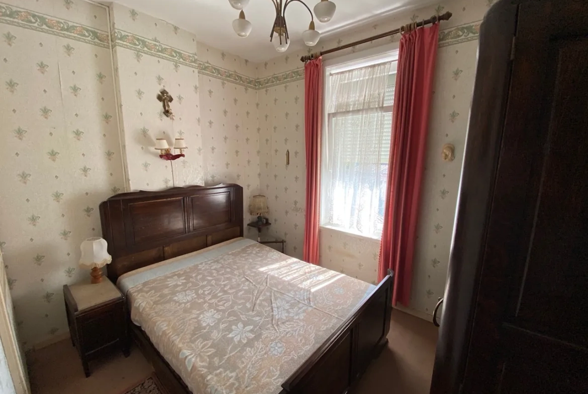 Maison en briques à Jeumont avec jardin et potentiel de rénovation 