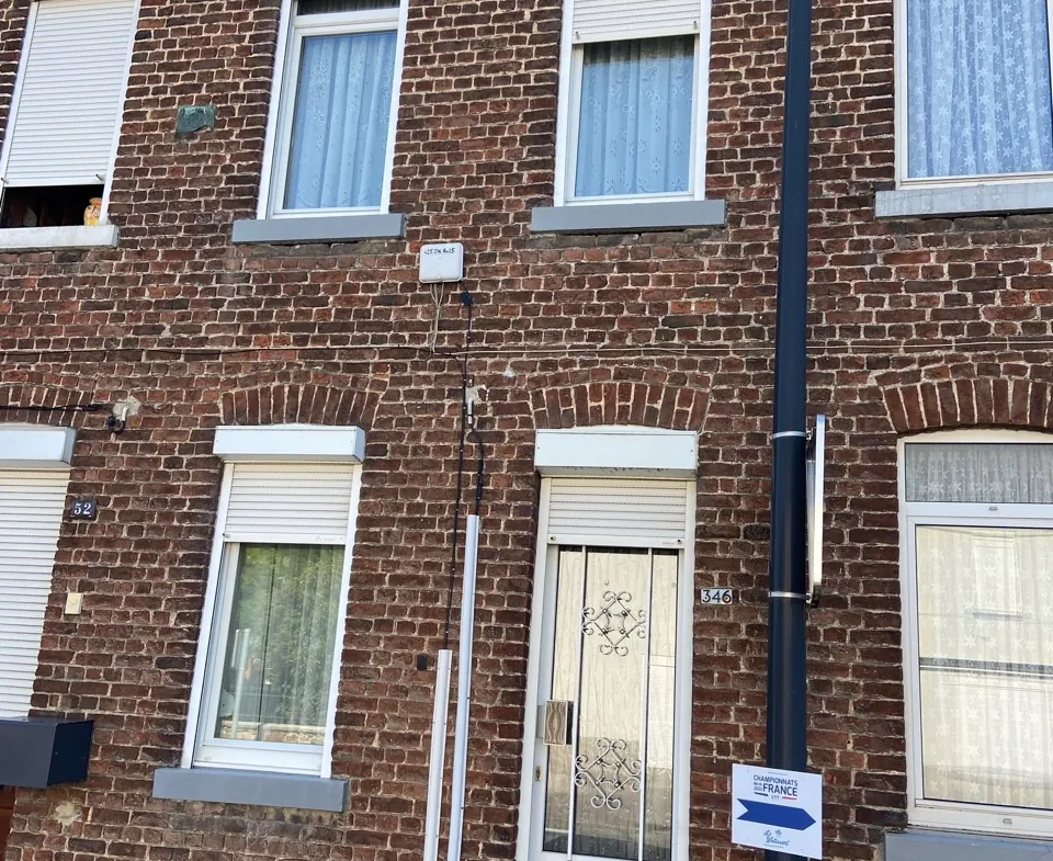 Maison en briques à Jeumont avec jardin et potentiel de rénovation 
