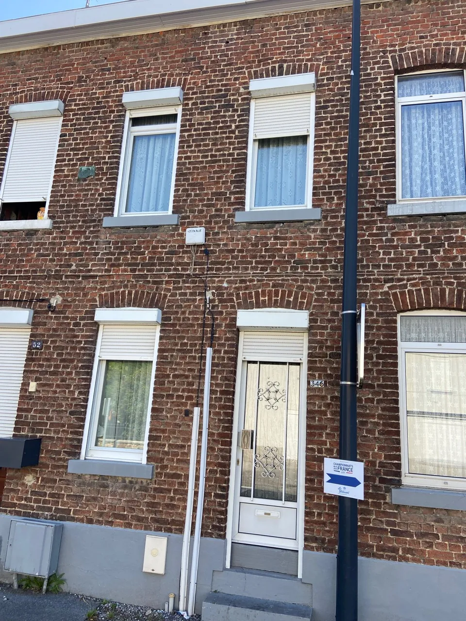 Maison en briques à Jeumont avec jardin et potentiel de rénovation 