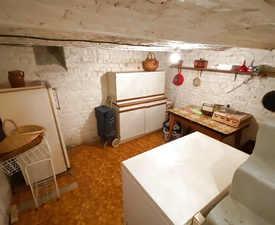 Maison en briques à Jeumont avec jardin et potentiel de rénovation 