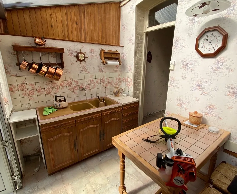 Maison en briques à Jeumont avec jardin et potentiel de rénovation 