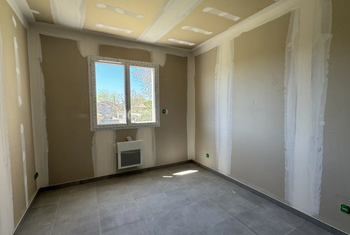 Maison neuve RT2012 de 83 m² avec garage et terrasse à Bezouce 