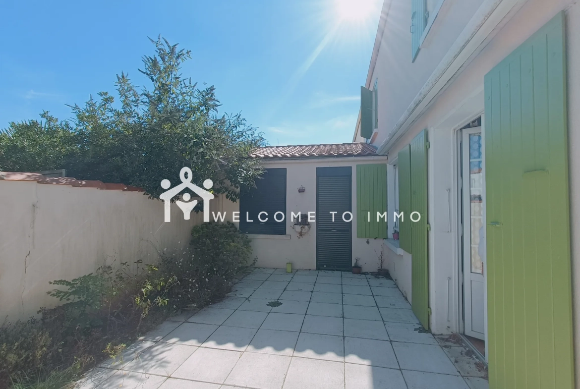 Maison familiale de 93m² à La Rochelle avec jardin, garage et terrasse 