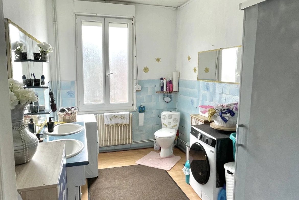 Maison à Saint-Quentin avec jardin, garage et grand parking - 112 m² 