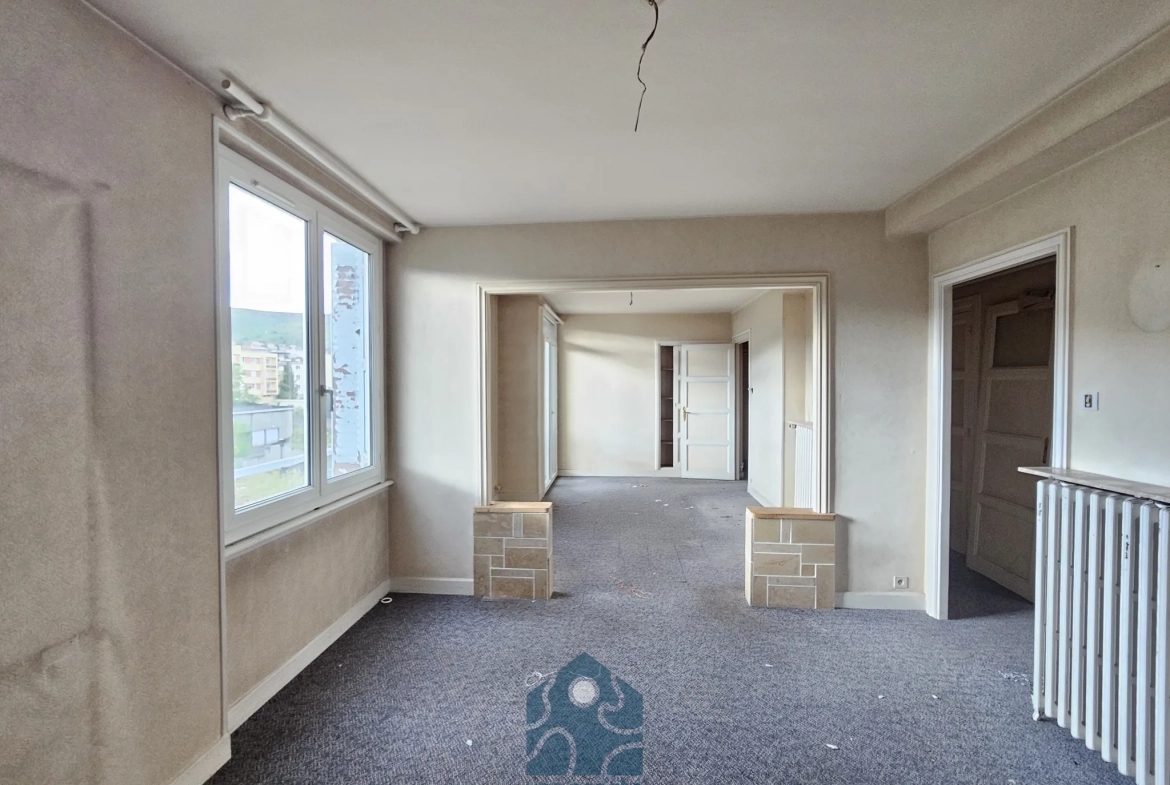 Appartement T3 à Clermont-Ferrand avec garage, balcon et vue sur le Puy-de-Dôme 
