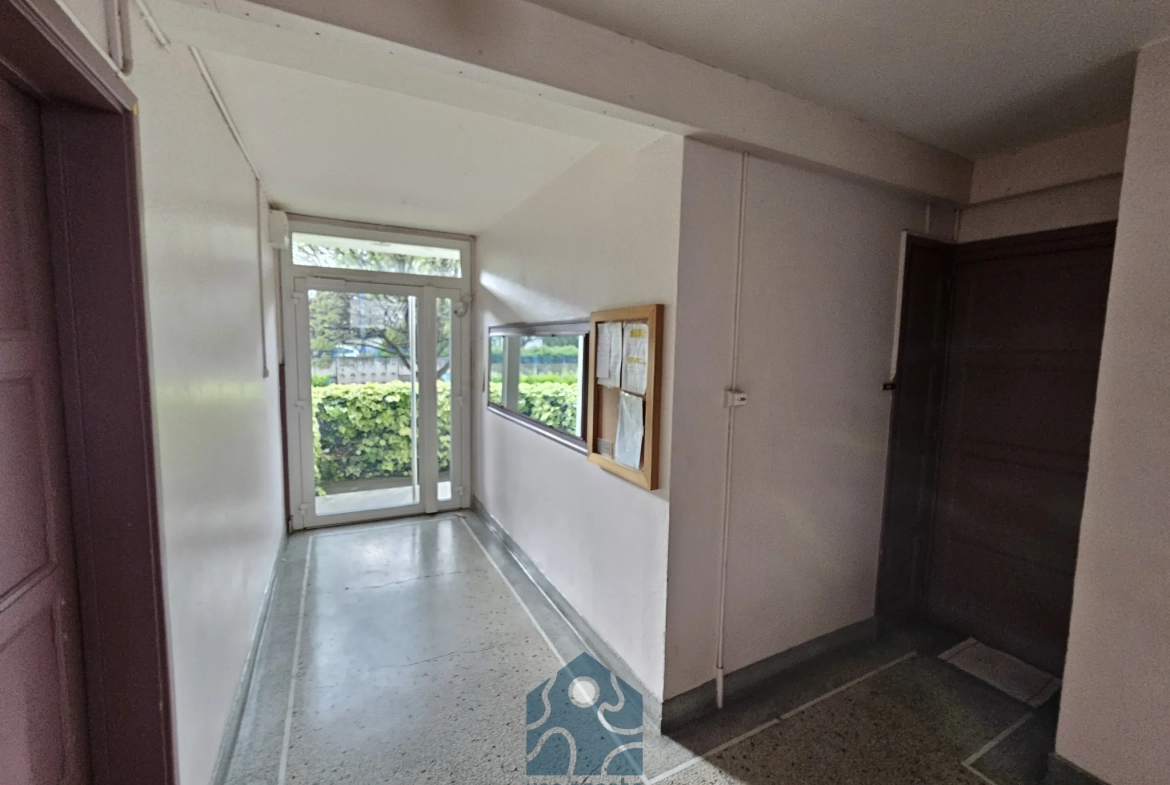 Appartement T3 à Clermont-Ferrand avec garage, balcon et vue sur le Puy-de-Dôme 