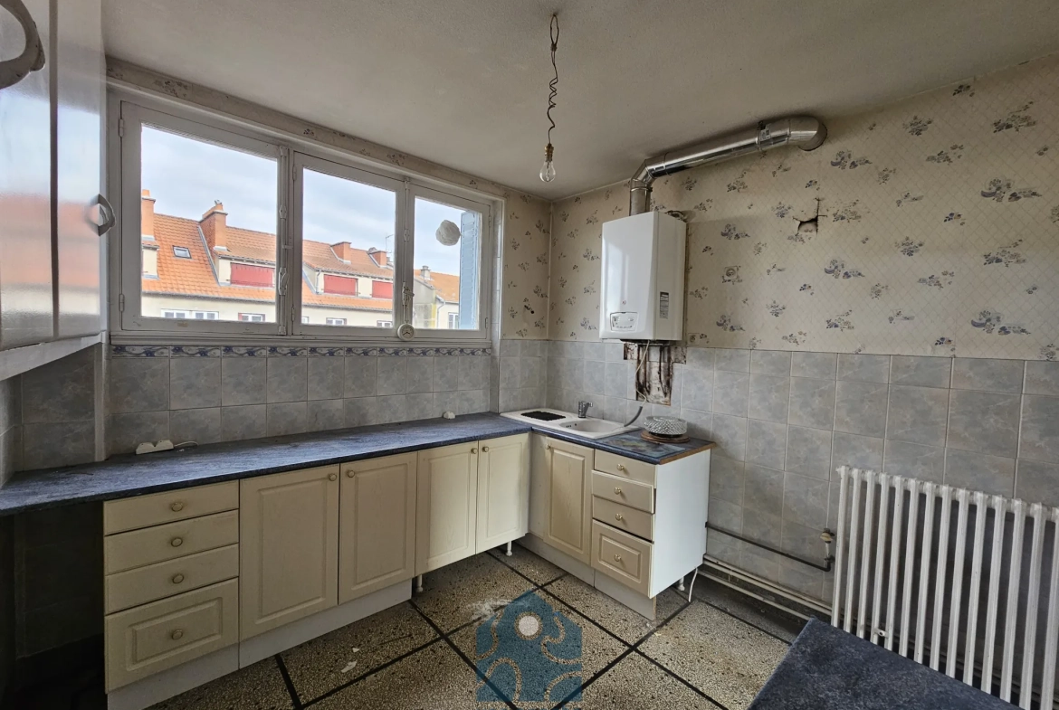 Appartement T3 à Clermont-Ferrand avec garage, balcon et vue sur le Puy-de-Dôme 