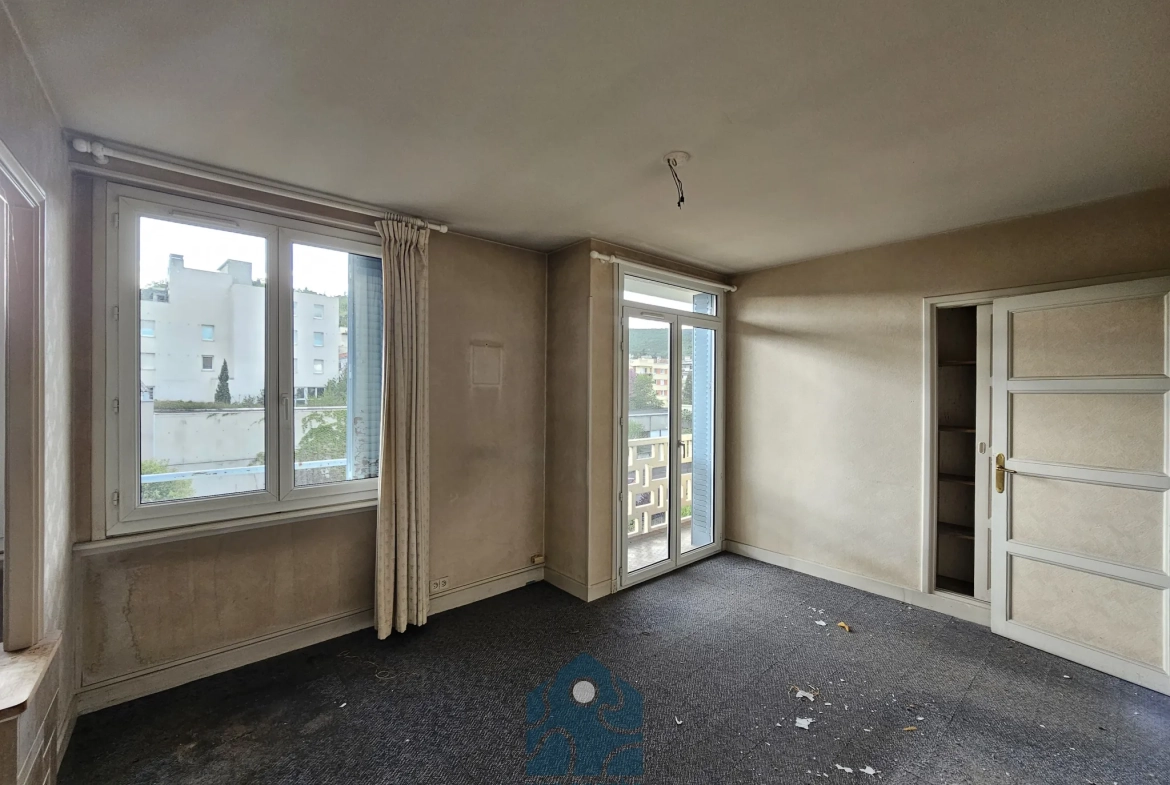 Appartement T3 à Clermont-Ferrand avec garage, balcon et vue sur le Puy-de-Dôme 
