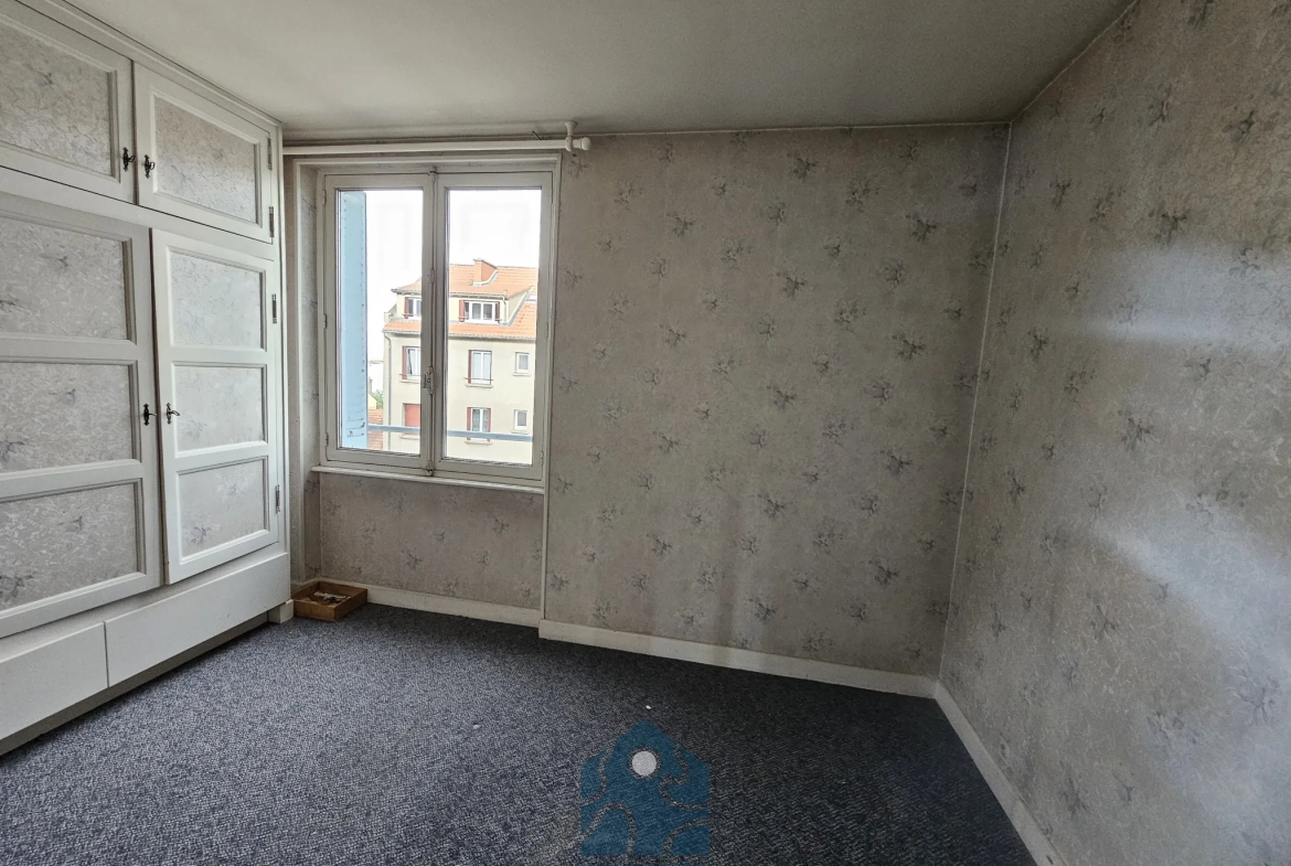 Appartement T3 à Clermont-Ferrand avec garage, balcon et vue sur le Puy-de-Dôme 