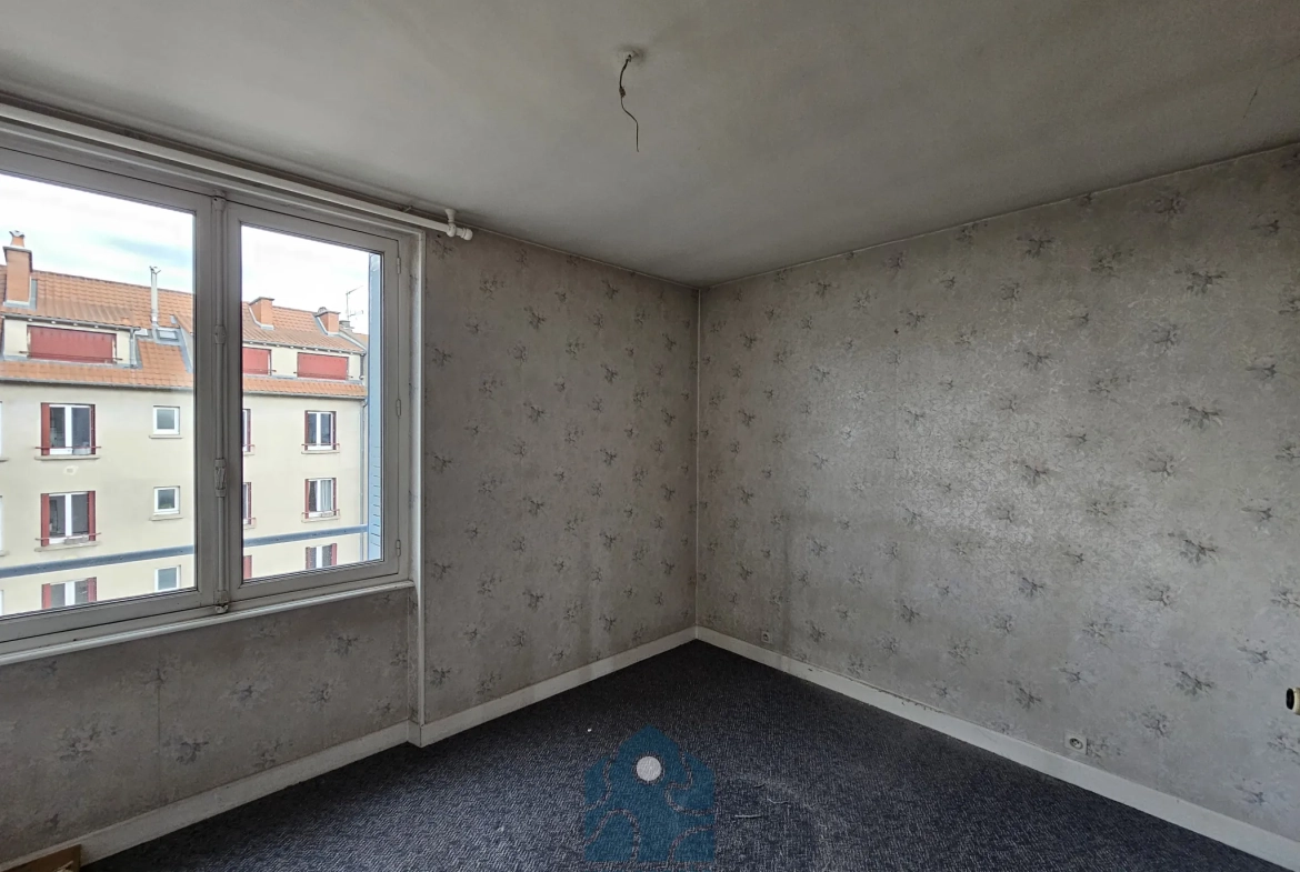 Appartement T3 à Clermont-Ferrand avec garage, balcon et vue sur le Puy-de-Dôme 