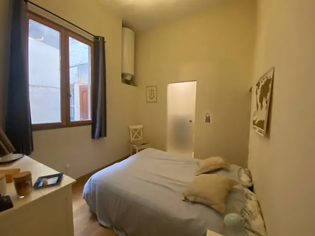 Appartement T3 de Charme avec Vue sur Jardin au Cœur de Nîmes 