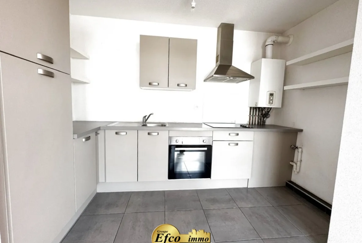 Appartement 2 pièces de 51,89 m² à Saint-Louis avec terrasse et parking 
