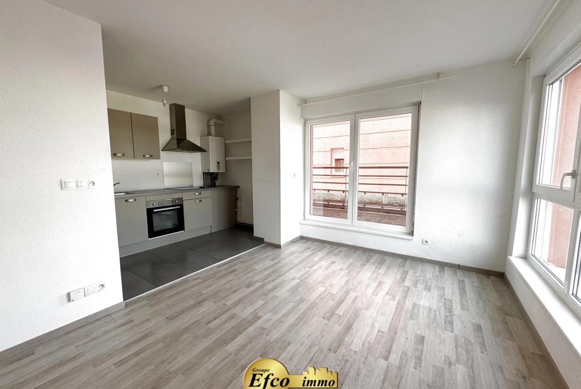 Appartement 2 pièces de 51,89 m² à Saint-Louis avec terrasse et parking 