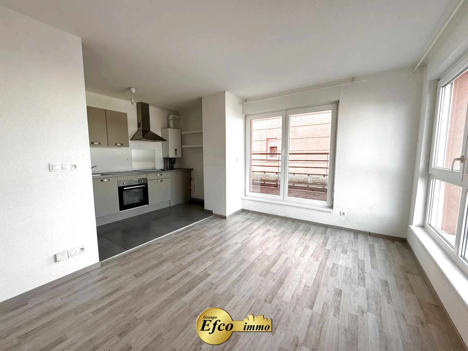 Appartement 2 pièces de 51,89 m² à Saint-Louis avec terrasse et parking 