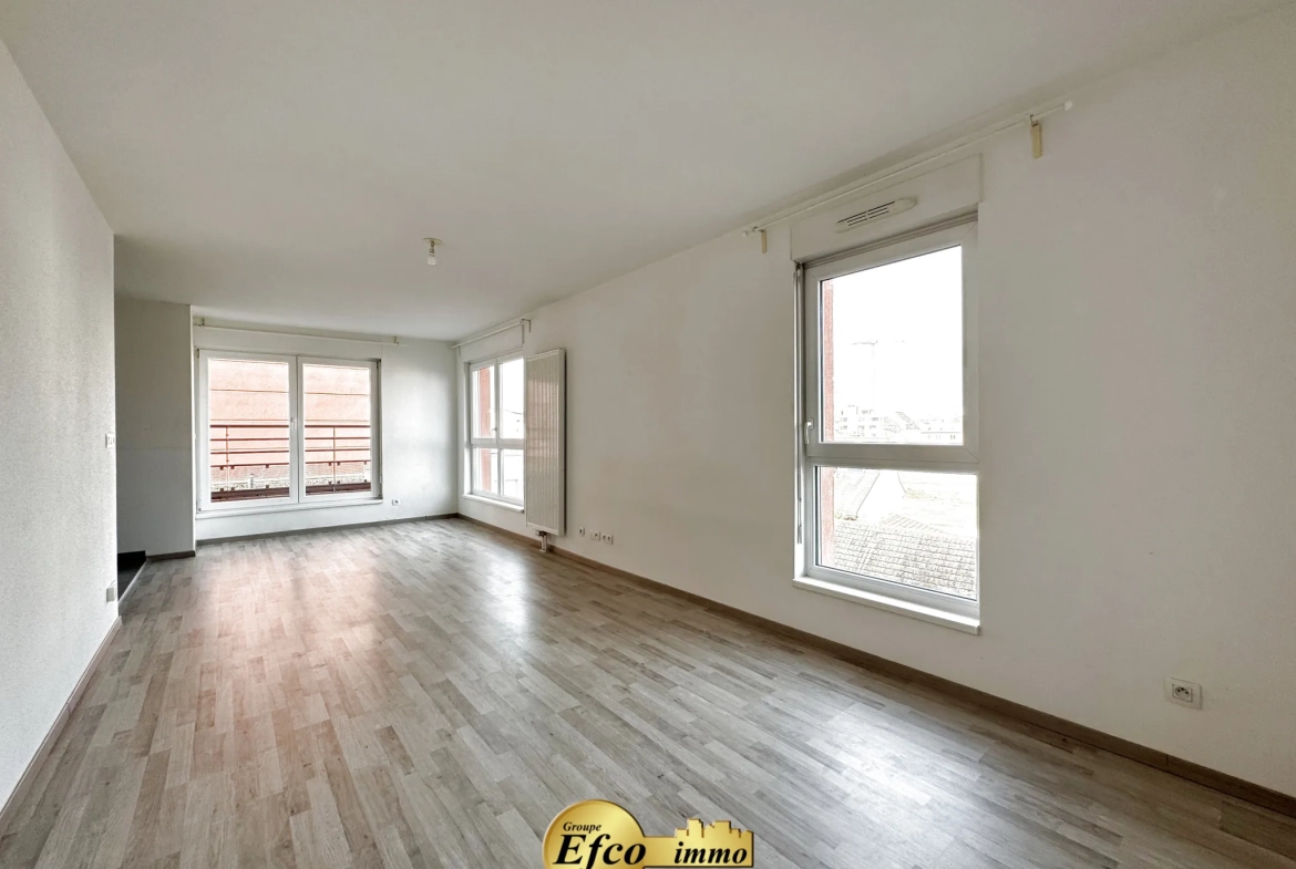 Appartement 2 pièces de 51,89 m² à Saint-Louis avec terrasse et parking 