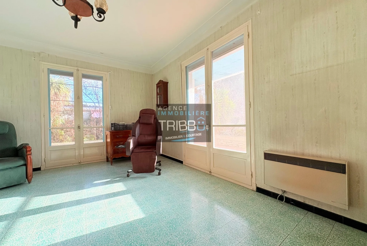 Maison de plain-pied à Thuir avec 4 chambres, garage et terrain de plus de 650 m² 