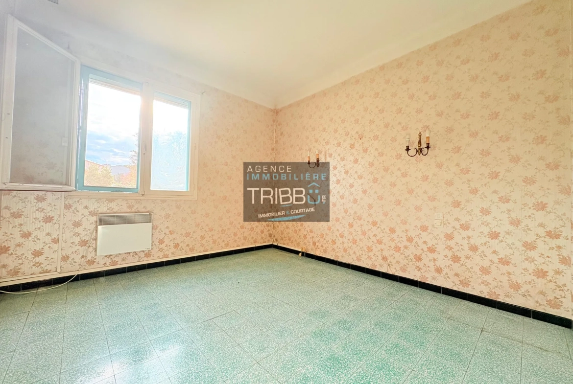 Maison de plain-pied à Thuir avec 4 chambres, garage et terrain de plus de 650 m² 