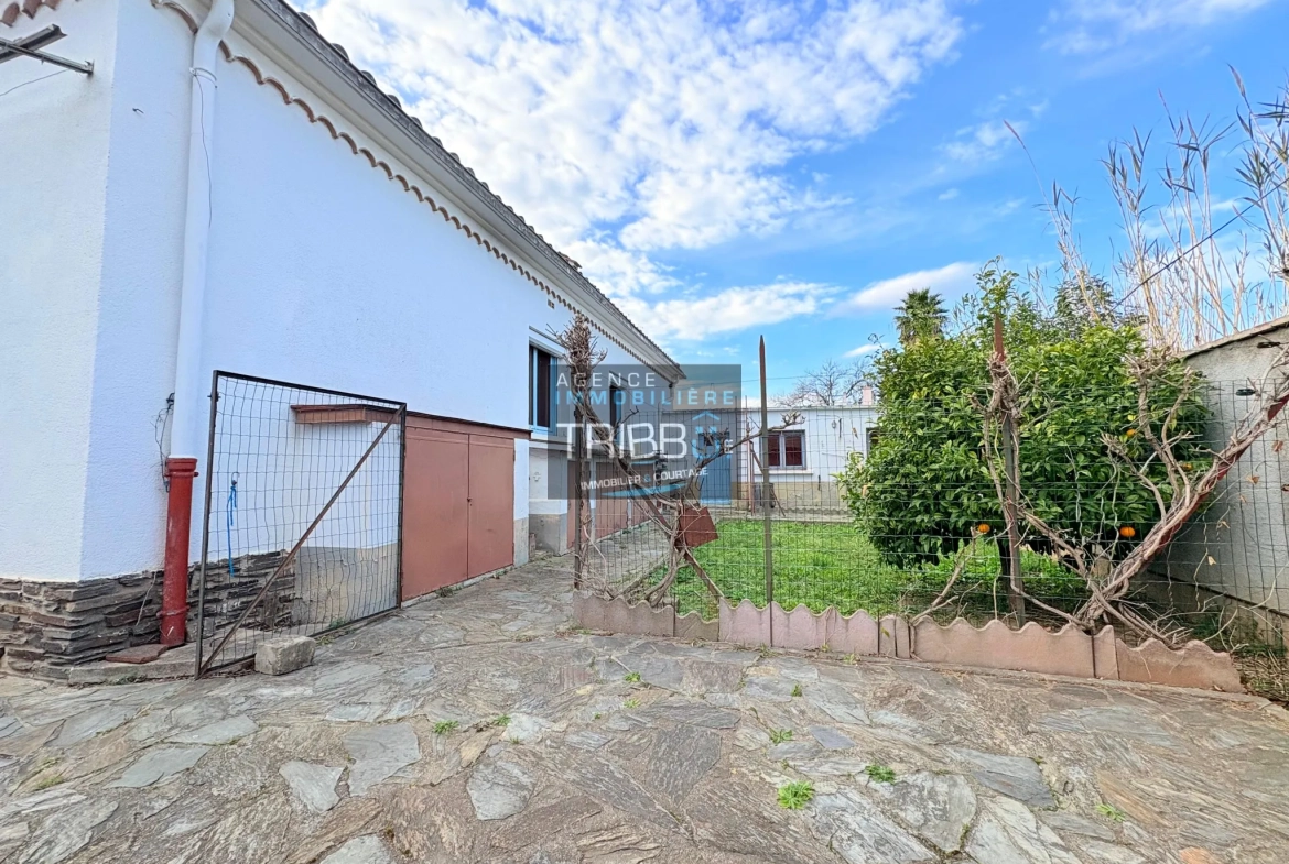 Maison de plain-pied à Thuir avec 4 chambres, garage et terrain de plus de 650 m² 