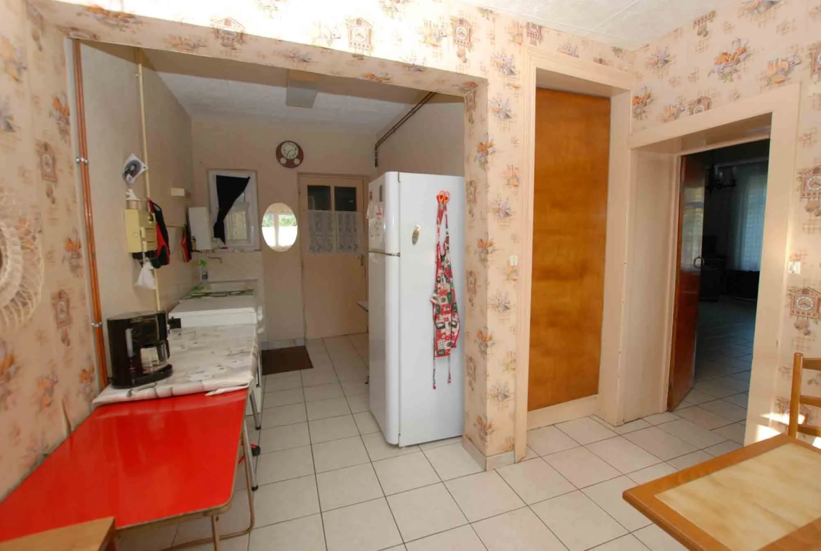 Maison semi-individuelle à vendre à Jeumont avec jardin et garage 
